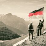 alpinisti con bandiera della Germania